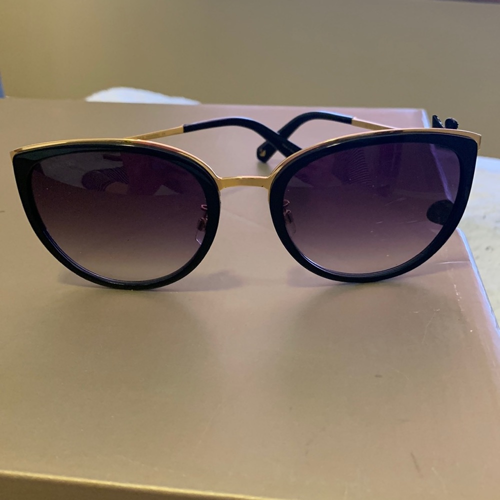 Swarovski sunglasses.